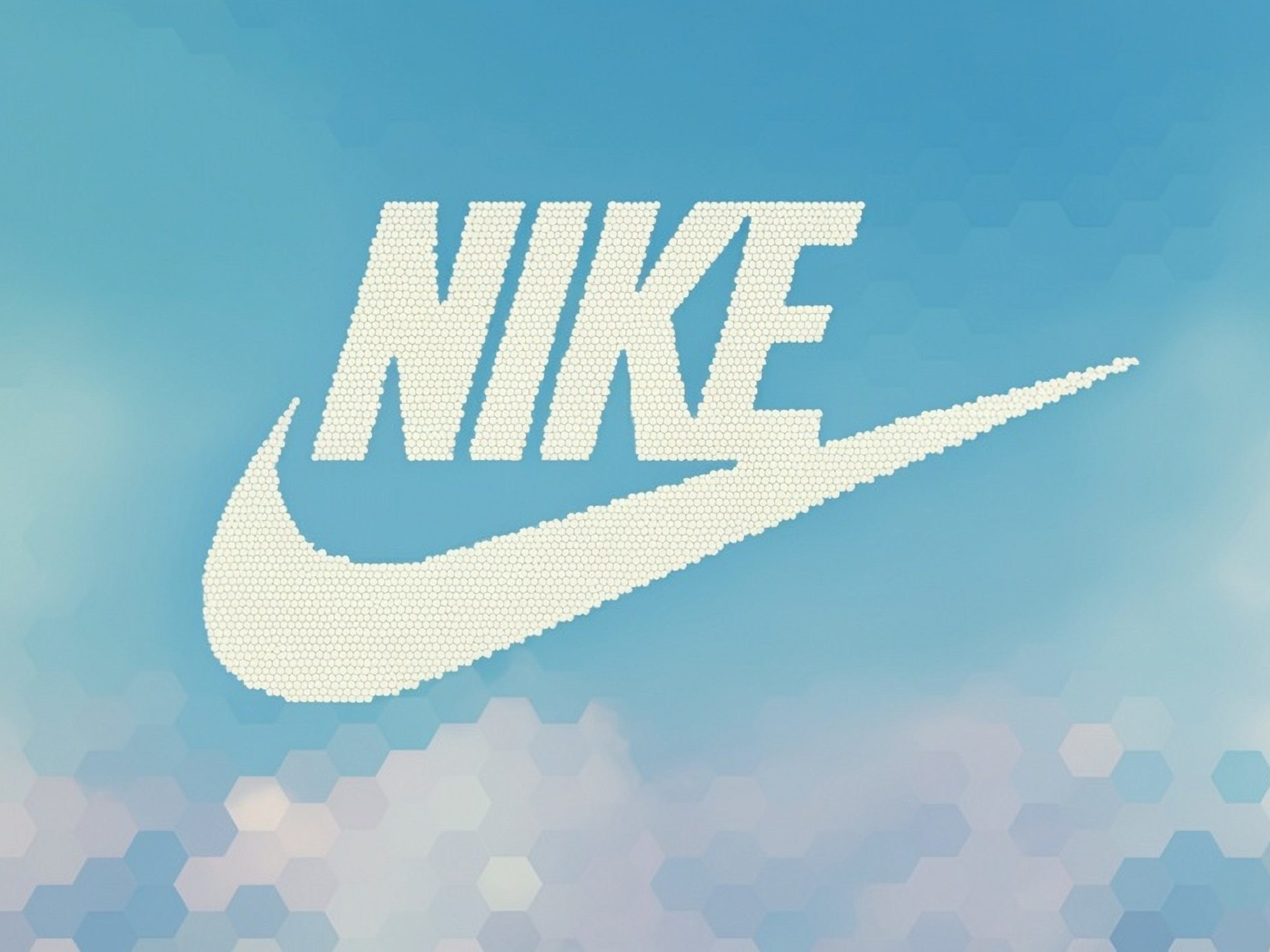 Nike logo with clouds and blue sky behind it