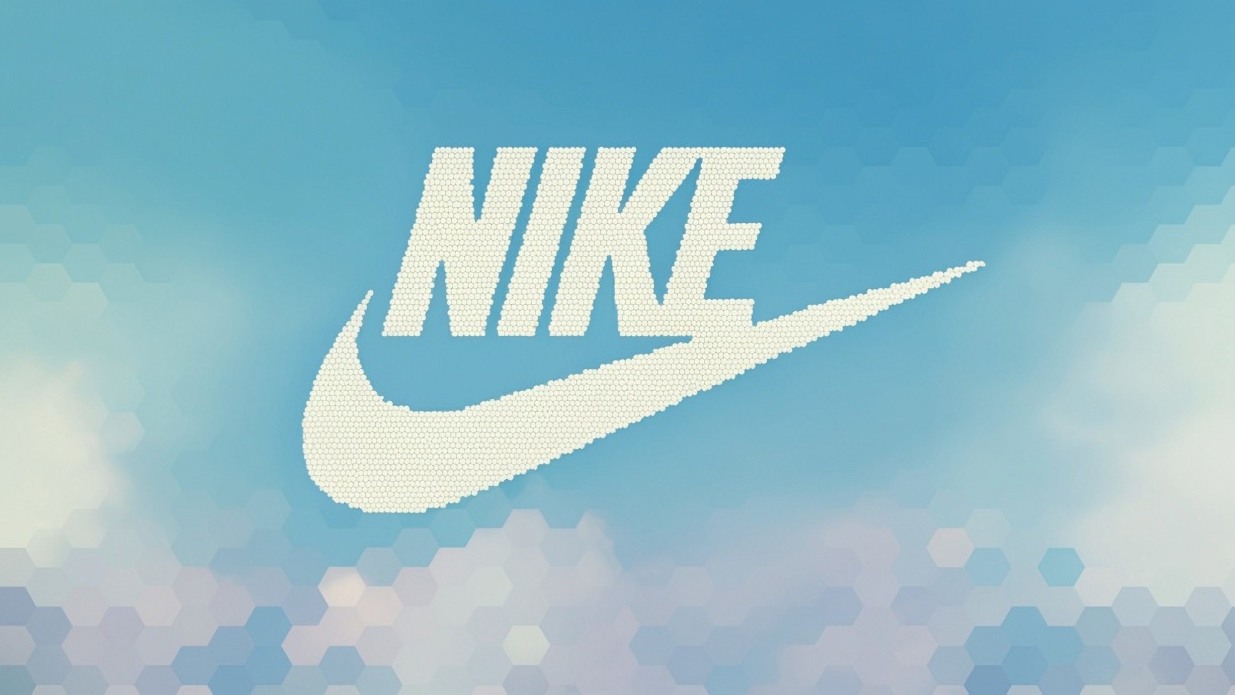 Nike logo with clouds and blue sky behind it