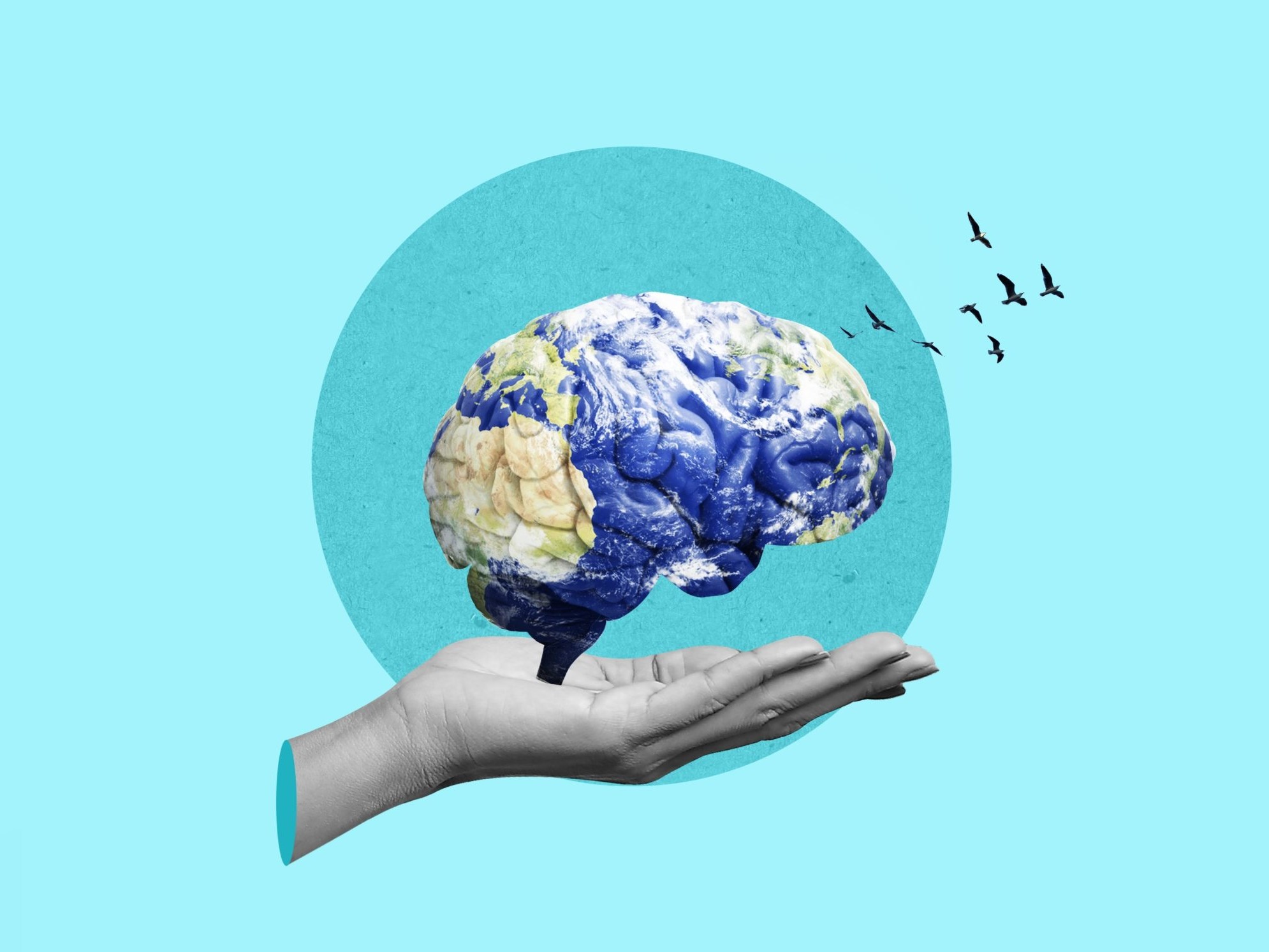 Graphic of hand hold the world map in the shape of a brain