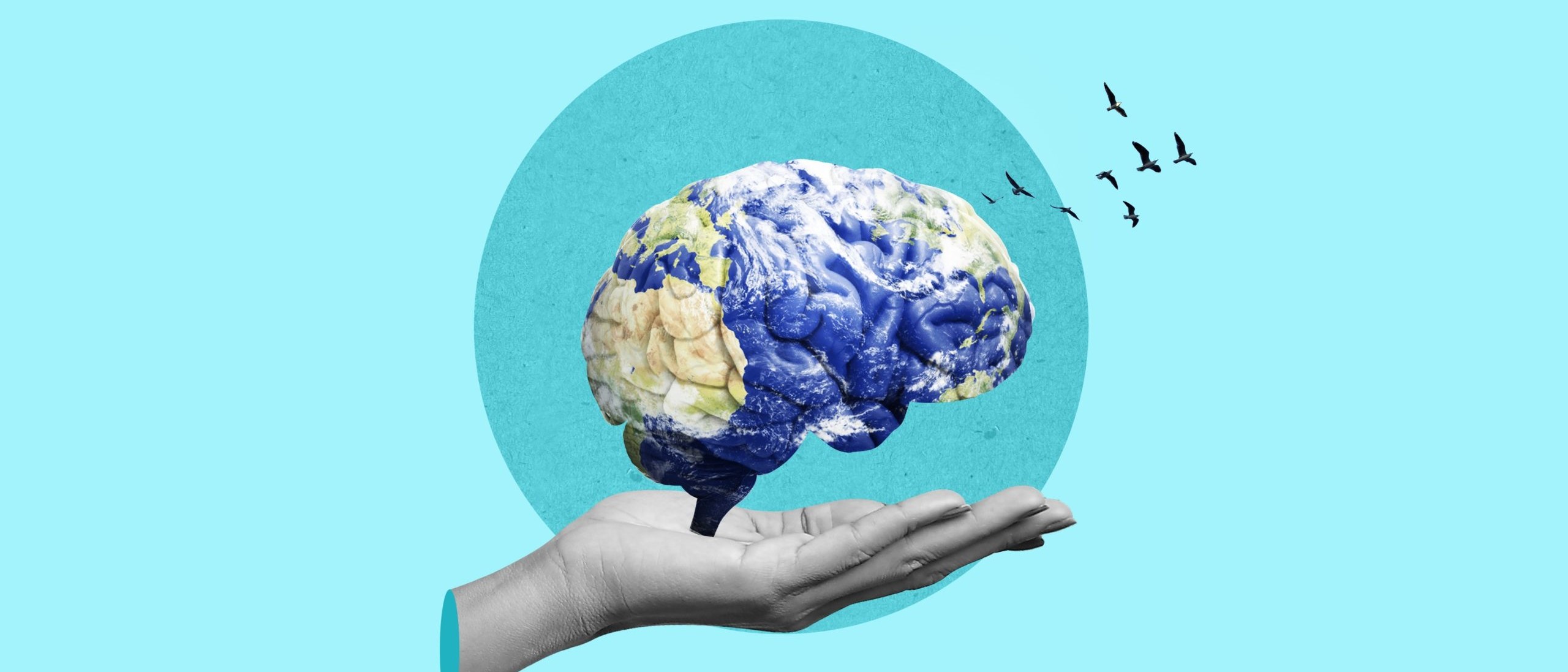 Graphic of hand hold the world map in the shape of a brain