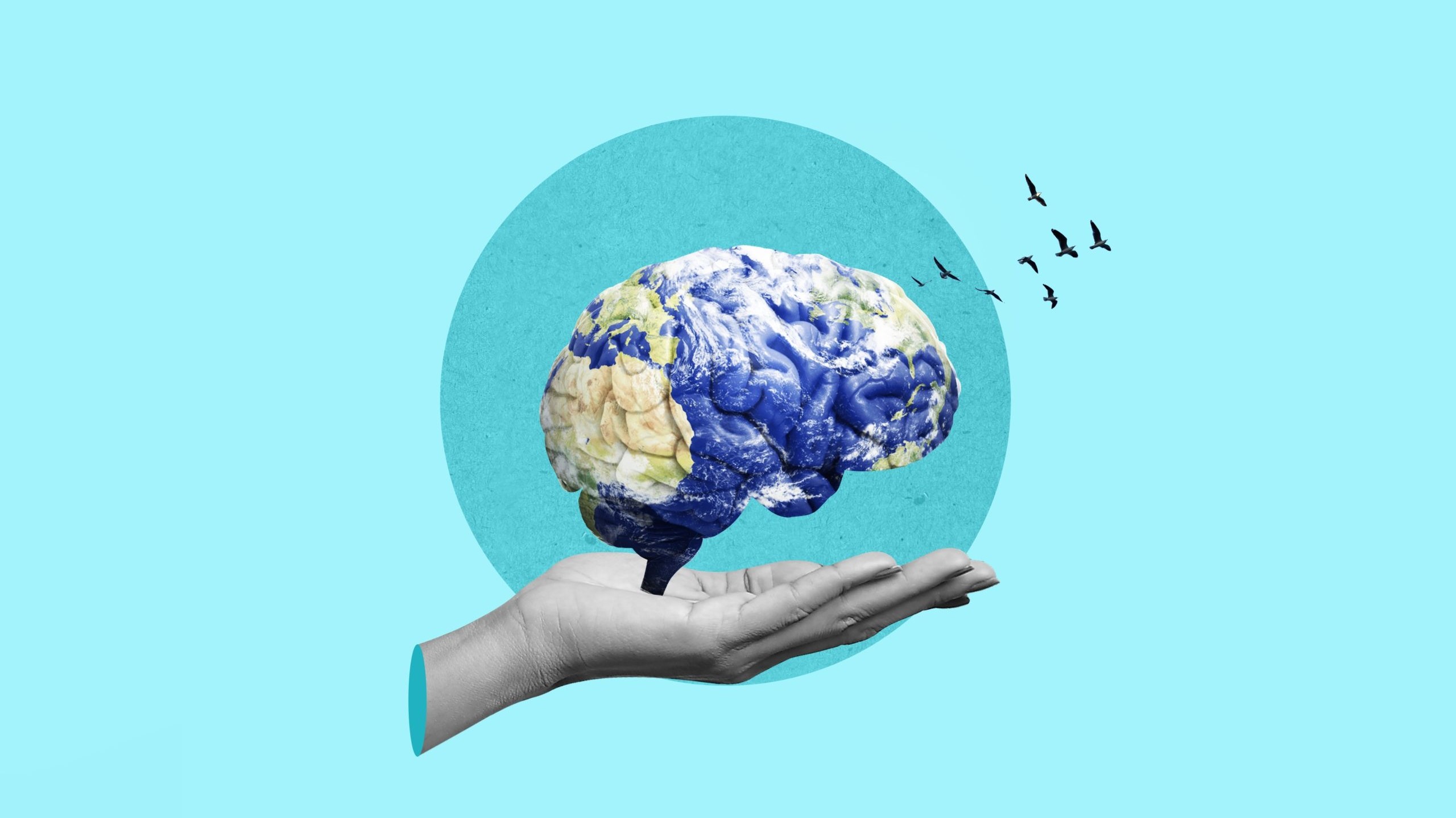 Graphic of hand hold the world map in the shape of a brain