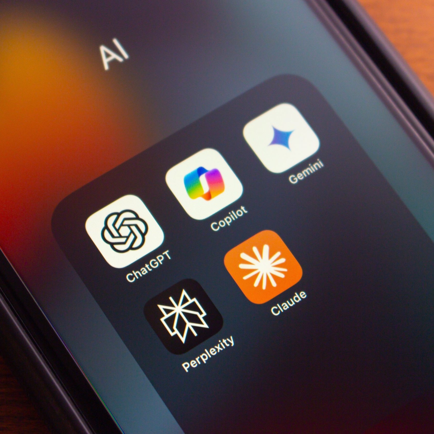 Image of phone showing AI apps