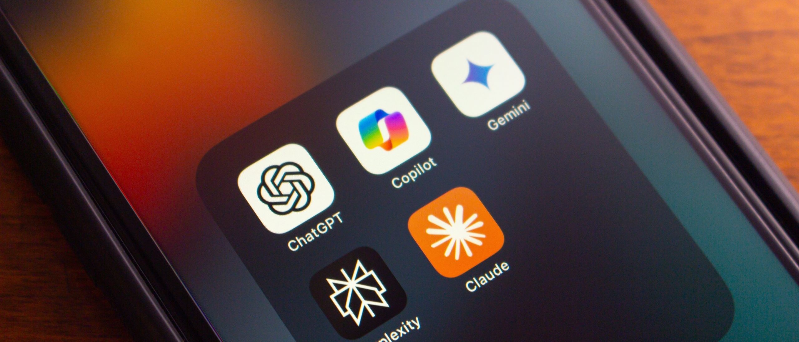 Image of phone showing AI apps
