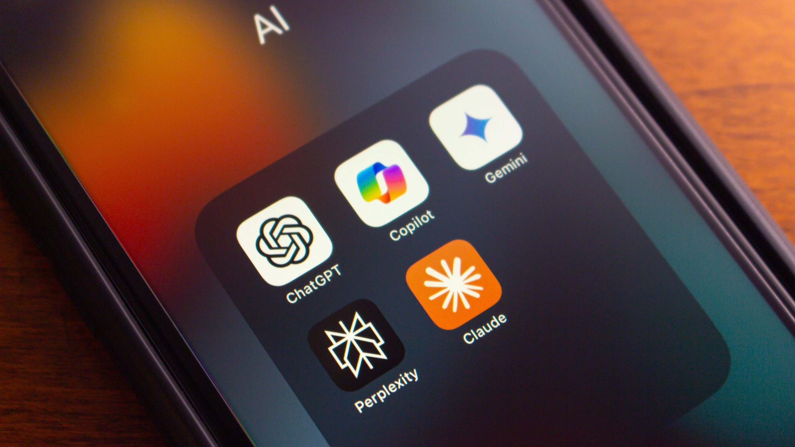 Image of phone showing AI apps