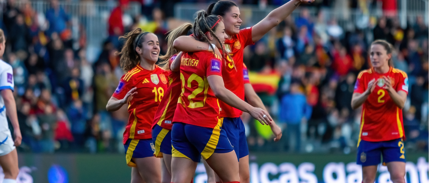Celebration shot of womens football players - Women's Sport