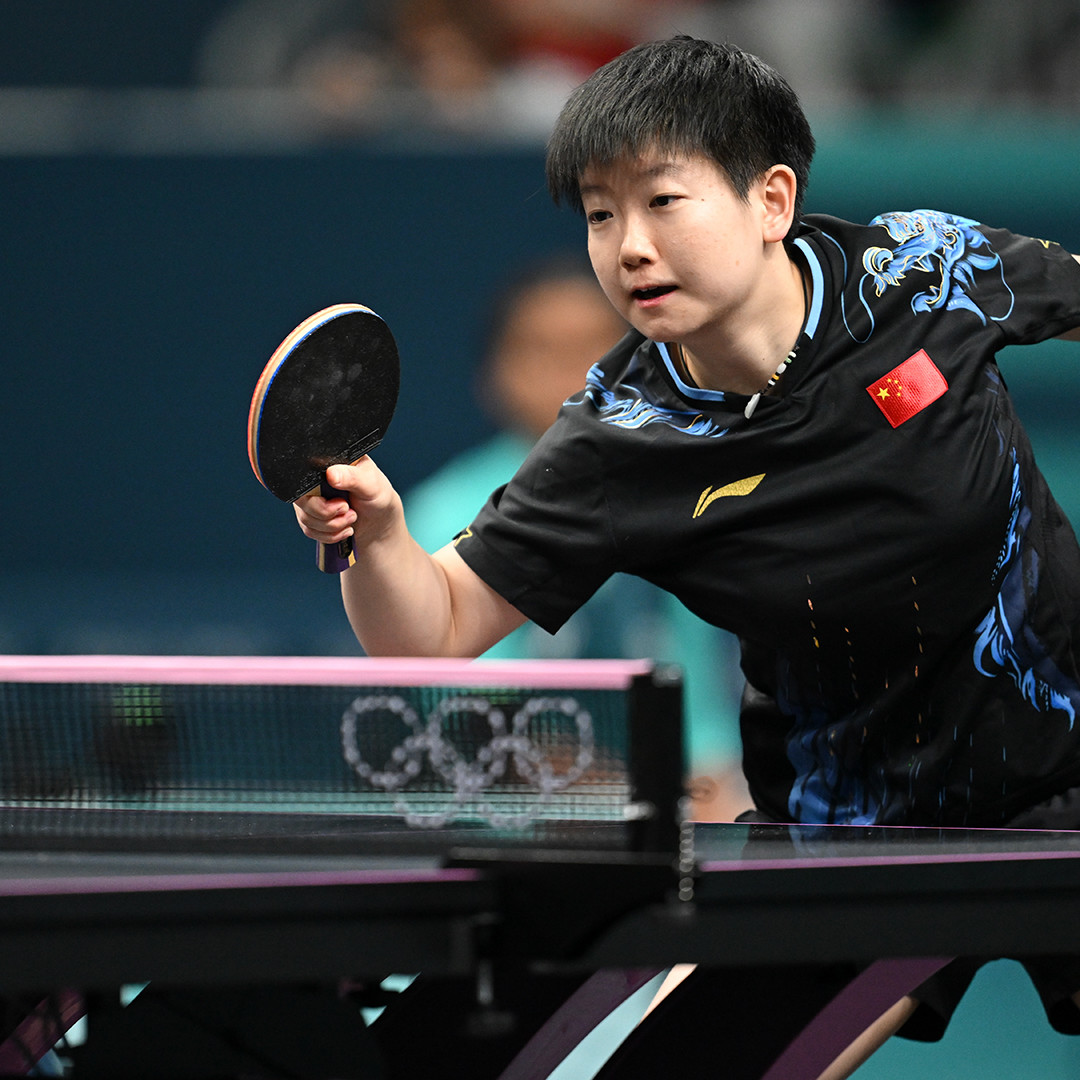Action shot of table tennis player