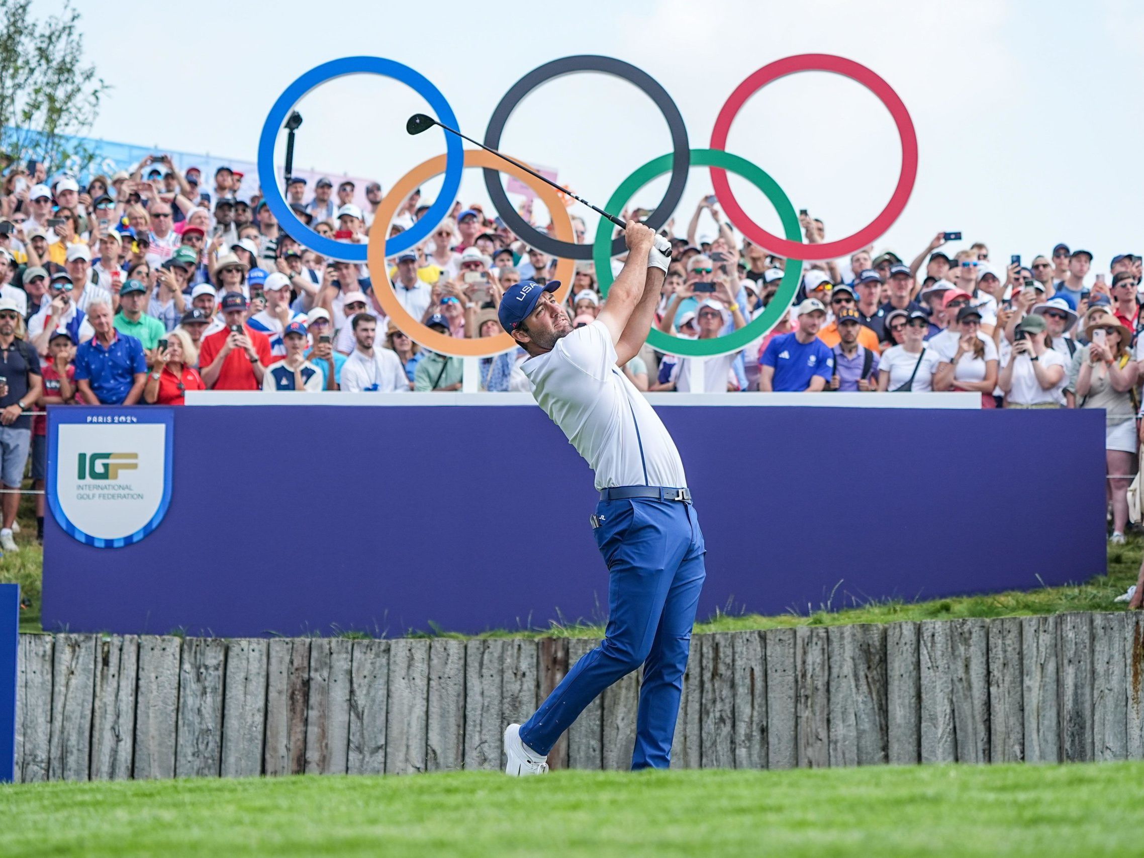 Scottie Scheffler taking tee shot at Olympic Games