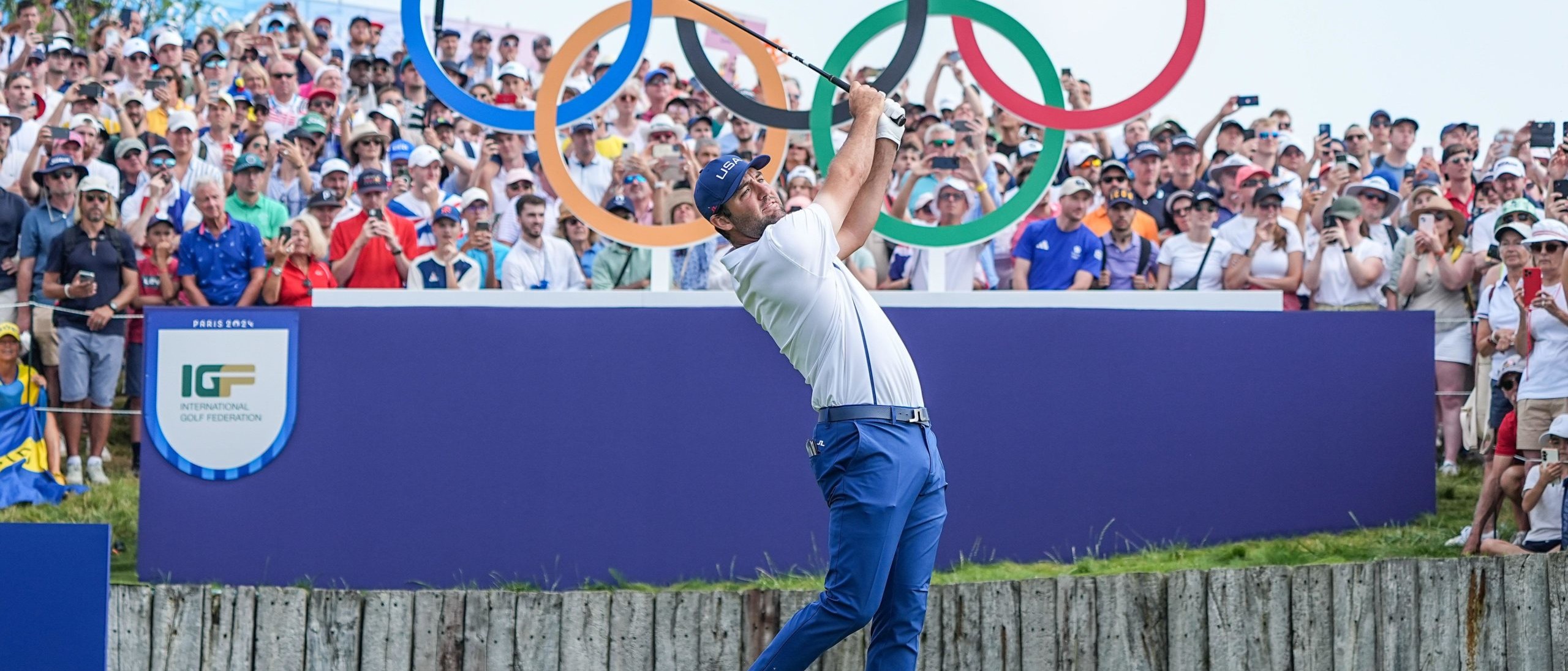 Scottie Scheffler taking tee shot at Olympic Games