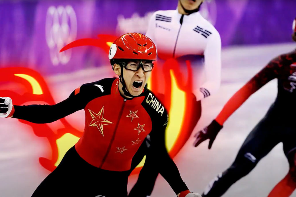 Chinese speed skater celebrating victory as he crosses the line